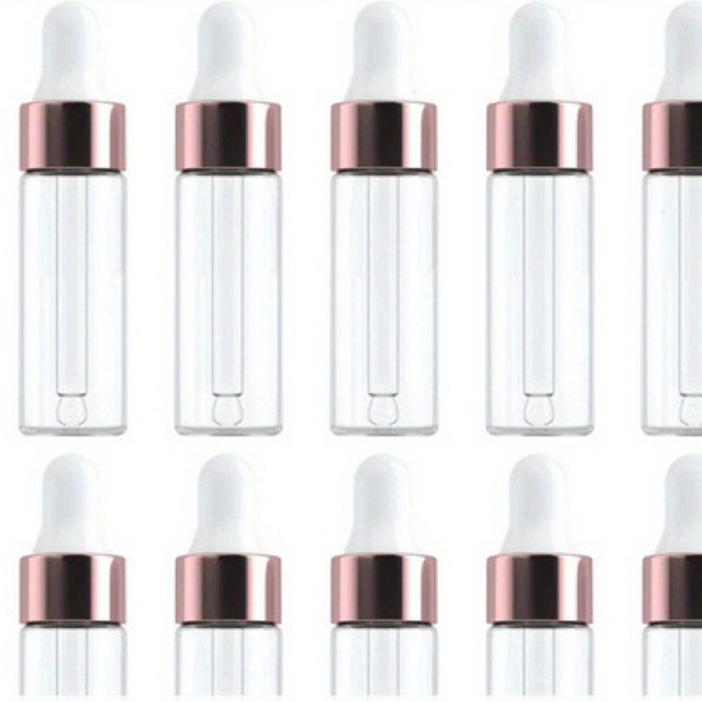 Set of 10 rose gold dropper bottles for essential oils 5ml size
